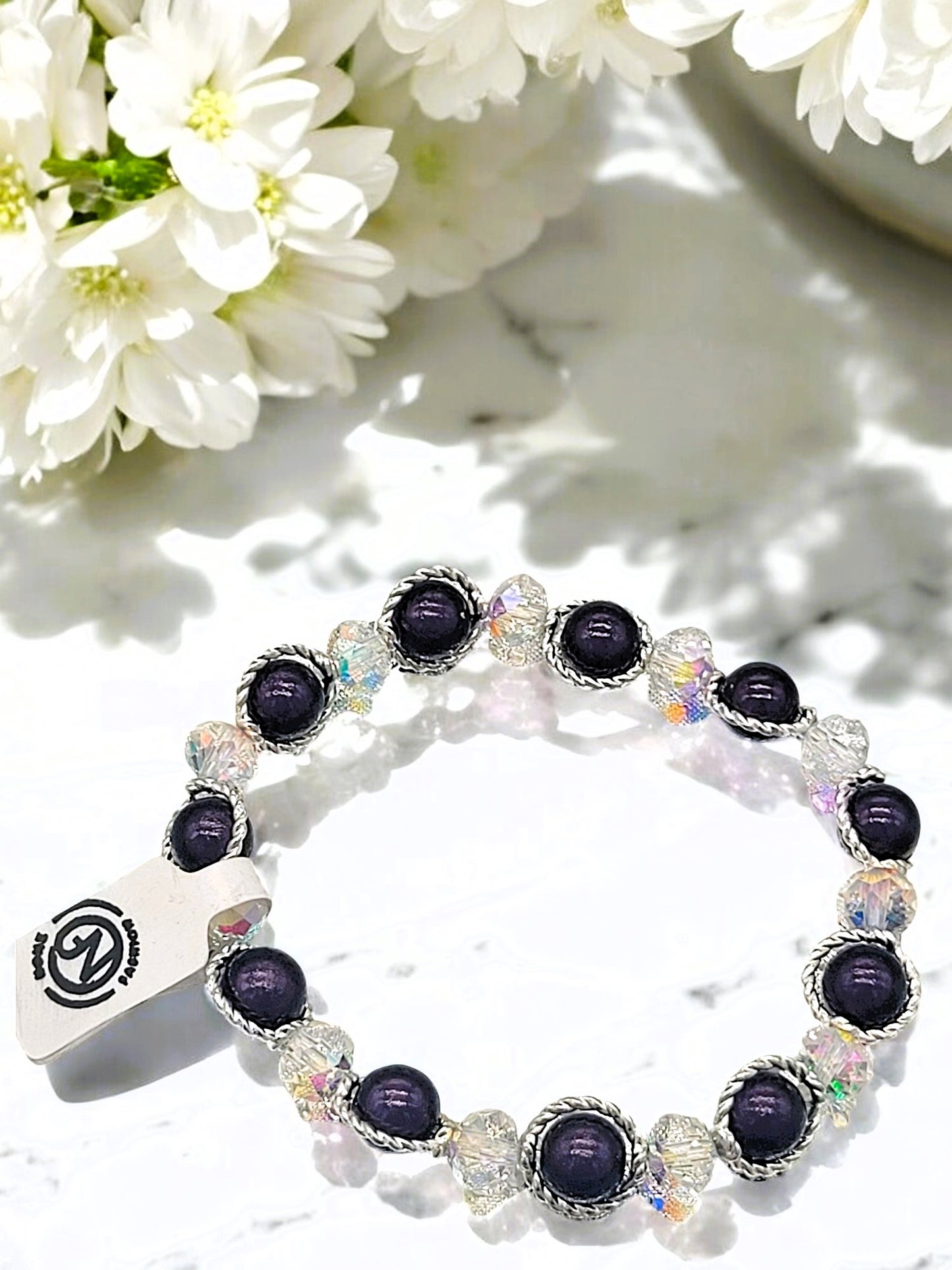 Besondere Magic-Pearls Armbänder mit zusätzl. Glasperlen in versch. Farben
